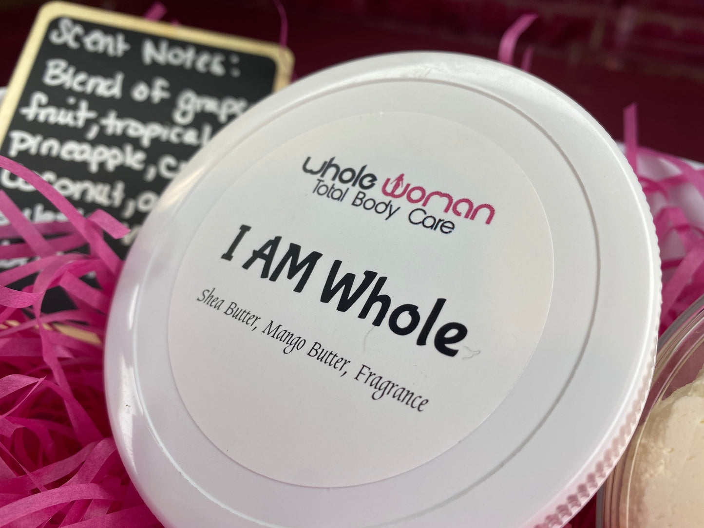 I am Whole is a whipped body butter with scent notes of fresh green apple, tart pineapple, juicy melon, and cherry pie notes come together in a sugary vanilla base. It is bright, fruity, and slightly tropical.